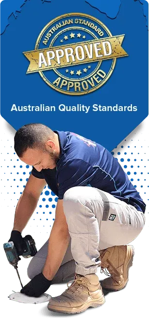 A plumber in Sydney fixing a blocked drain 